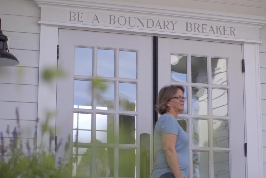 Co-owner Diana Lyttle at the entrance to the Tasting Room.